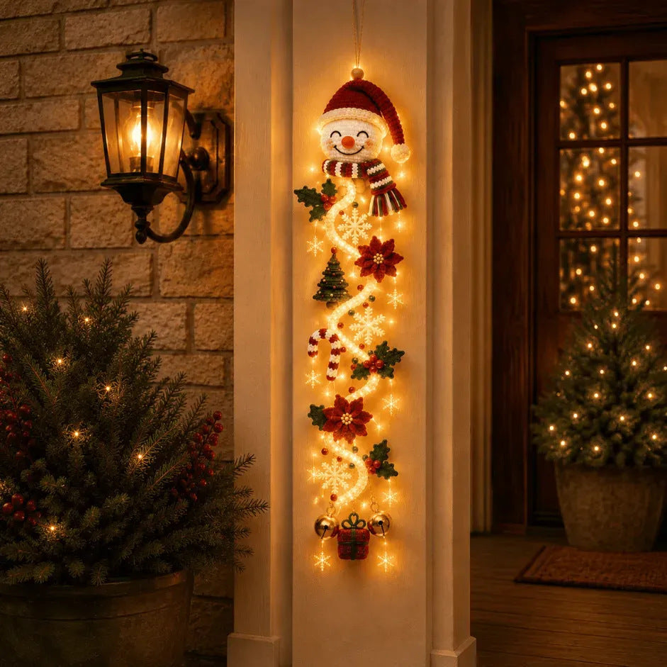 Colgante luminoso de muΓ±eco de nieve en la puerta